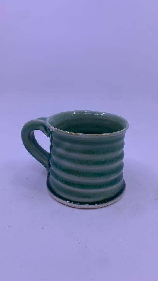 CERAMIC GREEN POTTERY RIBBED MUG.