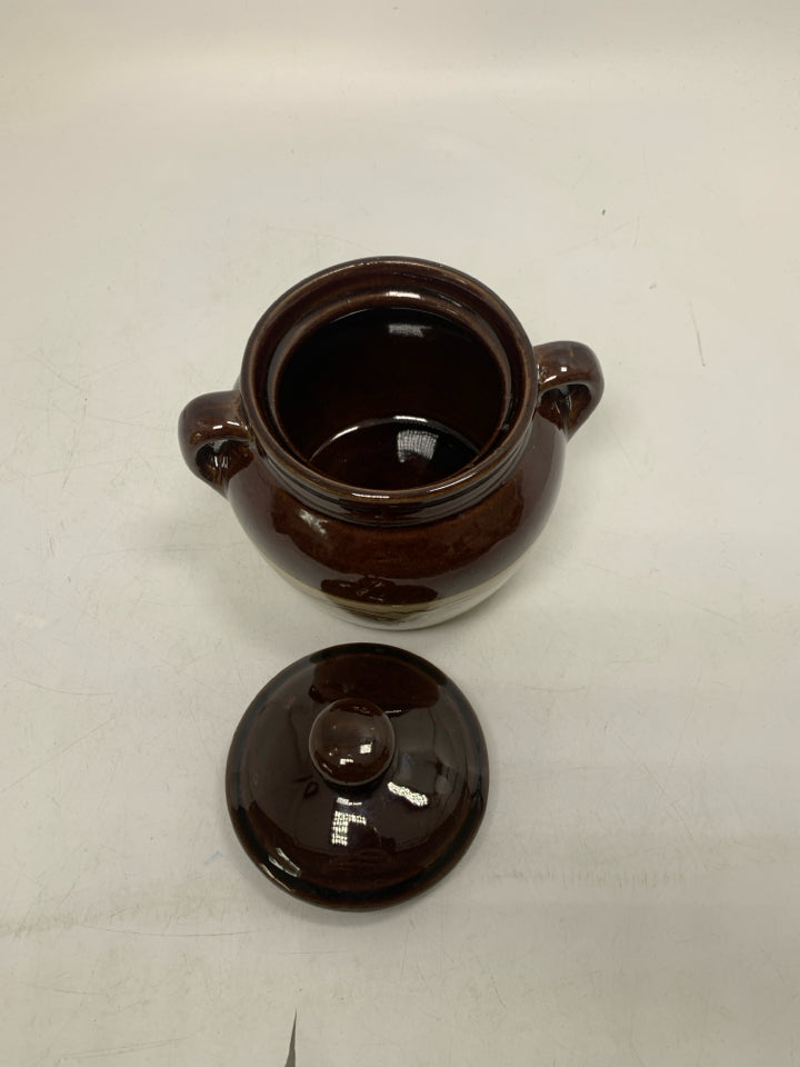 TWO TONED PAINTED BULL HEADED DOUBLE HANDLED CROCK.