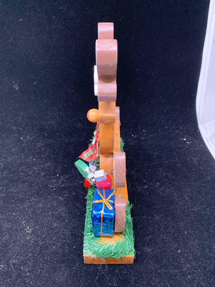 WOOD SITTING RUDOLPH WITH GIFTS.