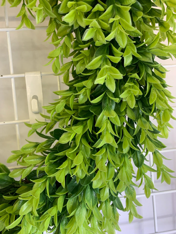 FAUX GREENERY WREATH W/TWIG BASE.