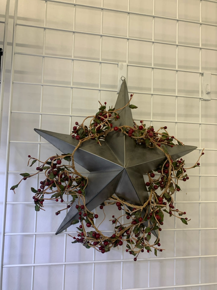 METAL STAR WALL HANGING W/ BERRY WREATH.
