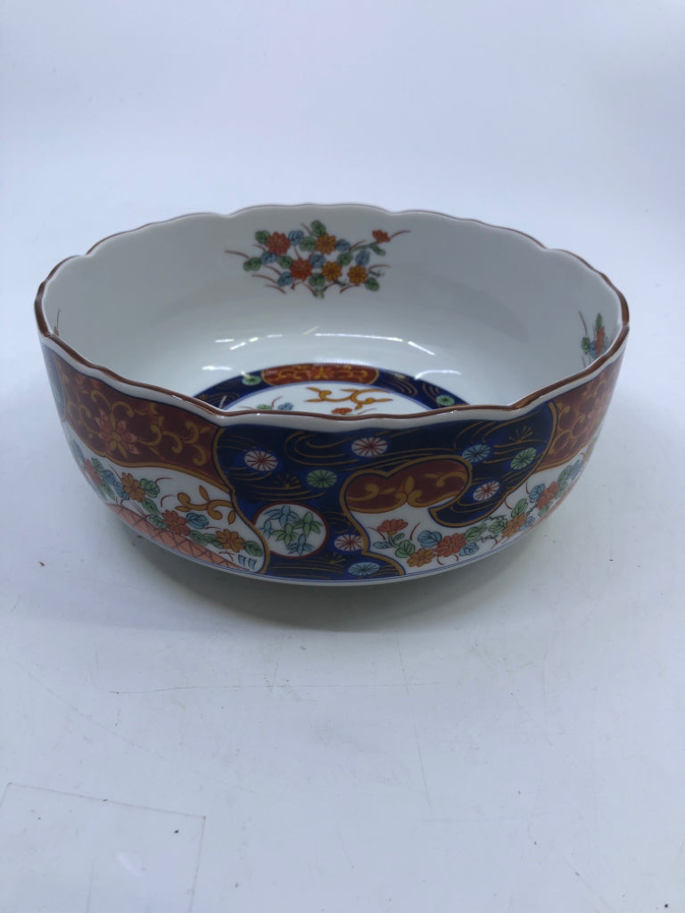 DARK BLUE RED DETAILED SERVING BOWL W/ ASSORTED FLOWER BOUQUET IN CENTER.