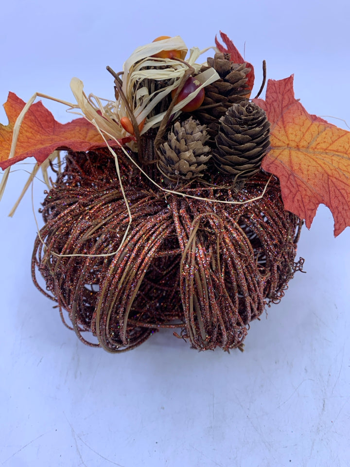 GLITTER TWIG PUMPKIN W/ PINECONES+LEAVES ON TOP.