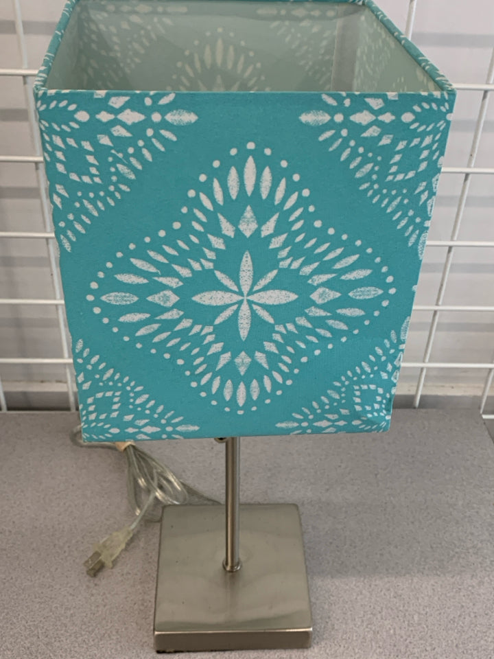 SILVER LAMP W/SQUARE TEAL SHADE.