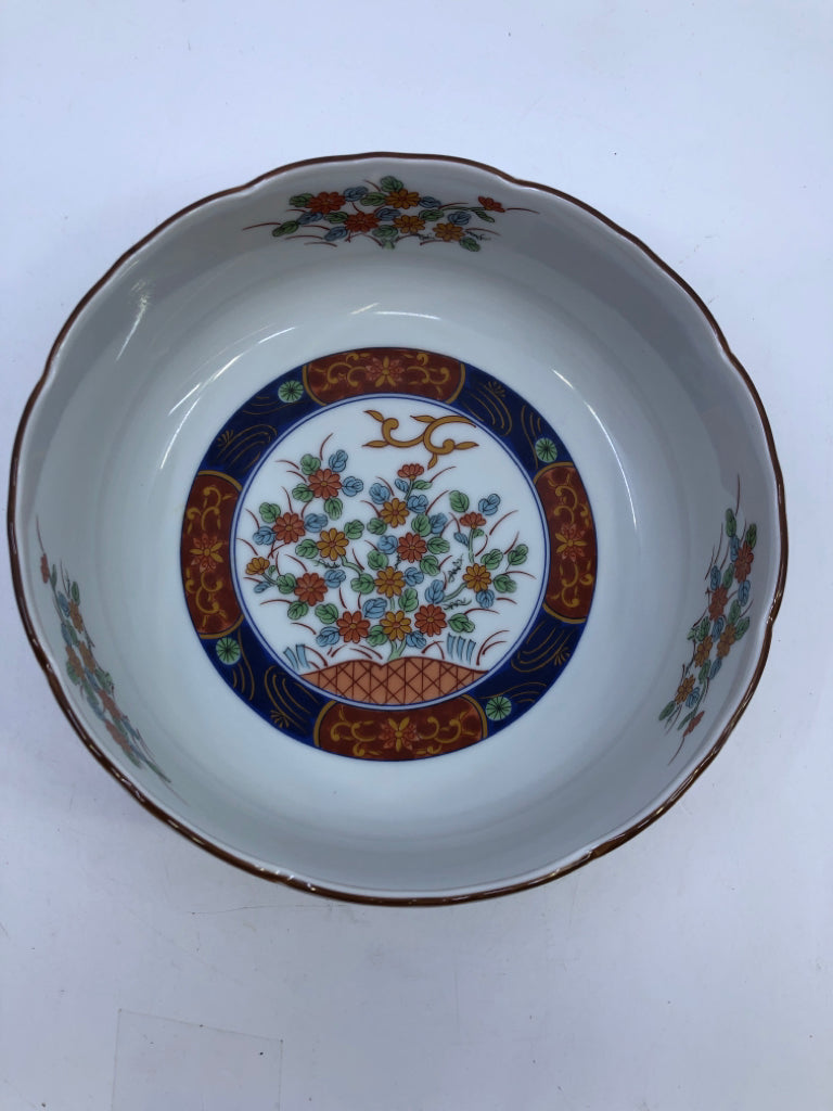 DARK BLUE RED DETAILED SERVING BOWL W/ ASSORTED FLOWER BOUQUET IN CENTER.