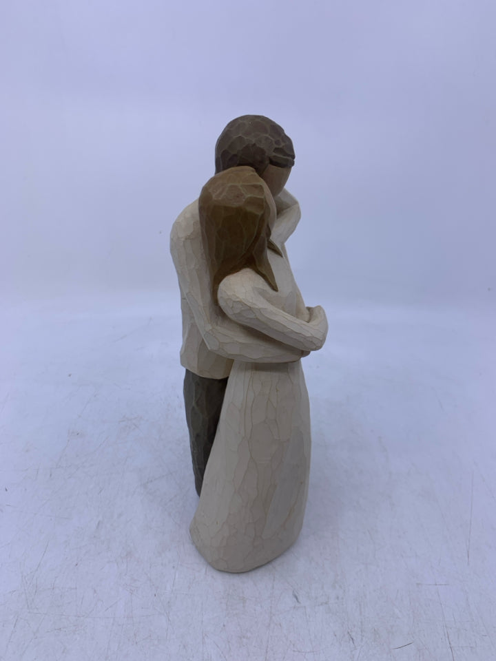 MAN/WOMAN HOLDING EACHOTHER "TOGETHER".