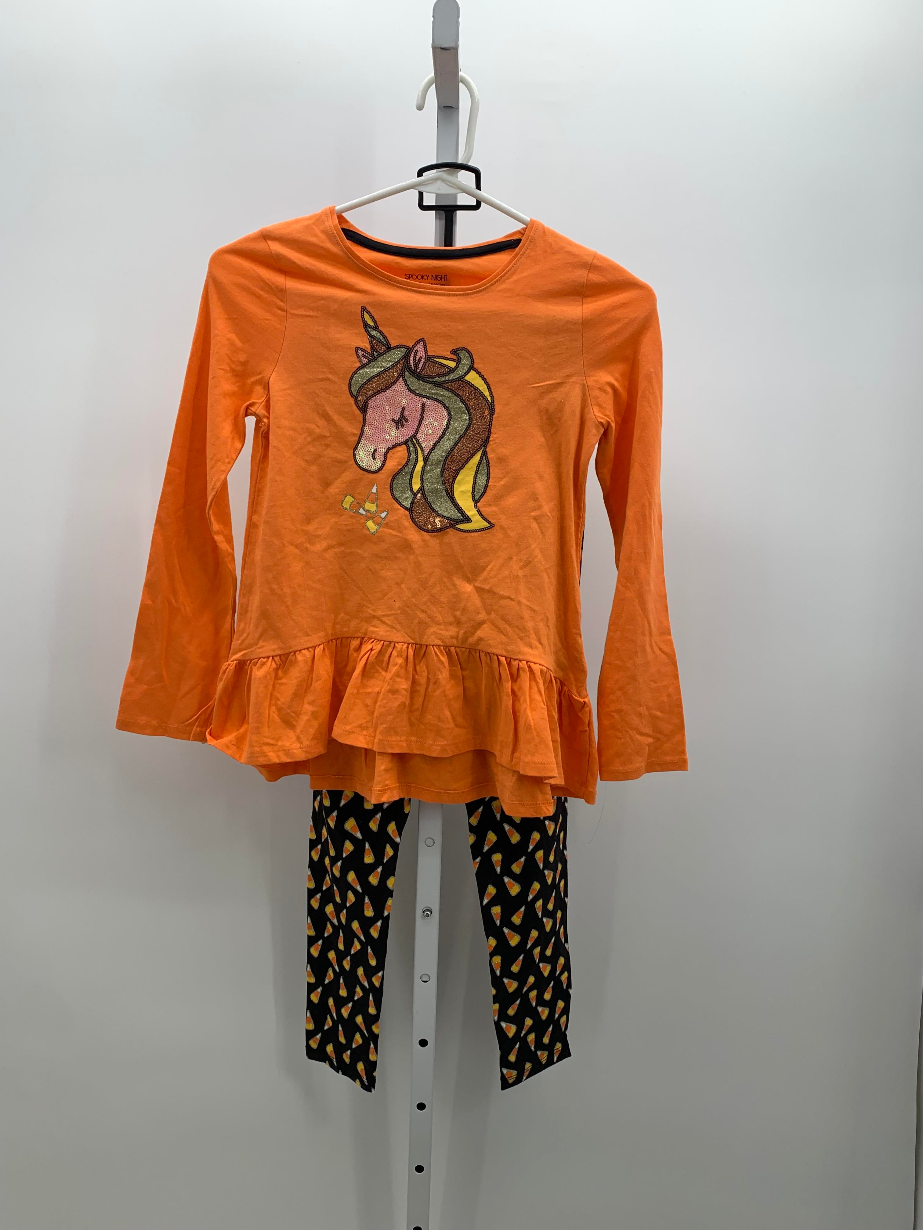 SEQUINS UNICORN SHIRT AND CANDY CANE PANTS.