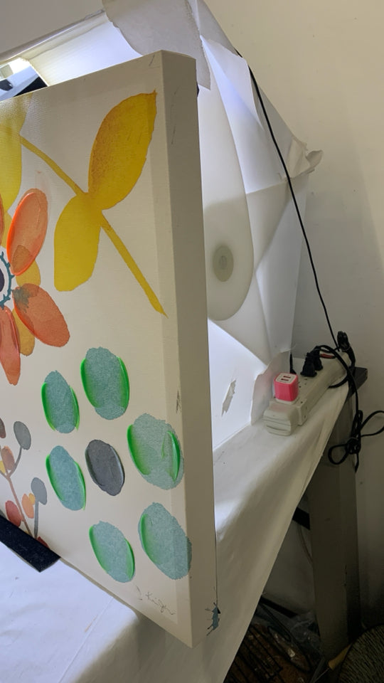 ORANGE AND YELLOW FLORAL CANVAS WALL ART.