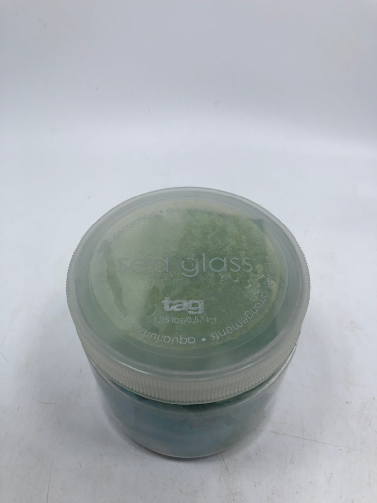 CONTAINER OF SEA GLASS.