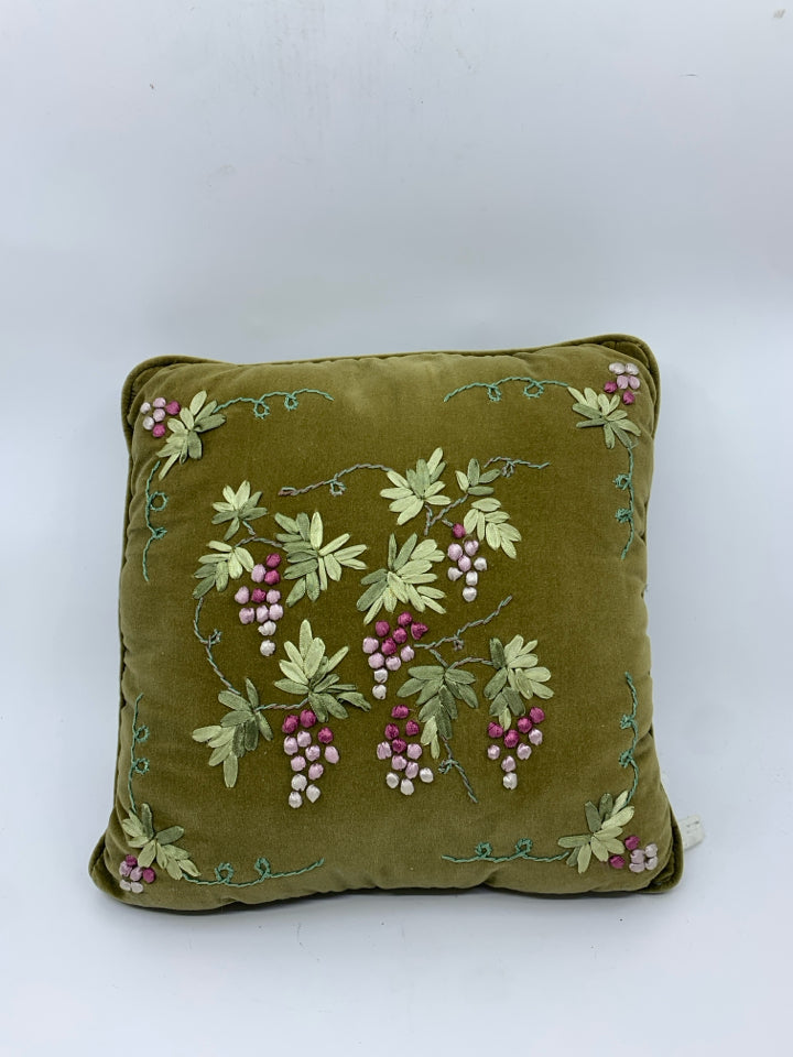 GREEN EMBROIDERED PILLOW.