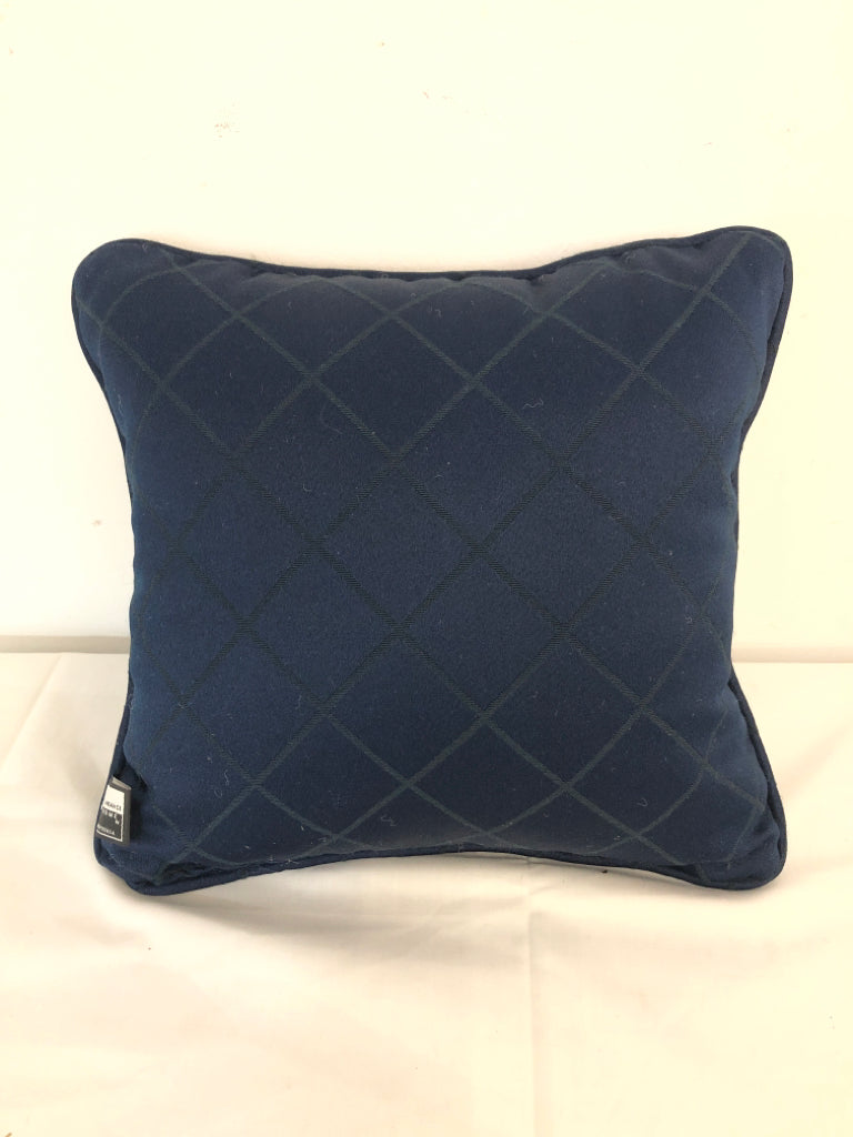 BLUE AND ORANGE SQUARE KNIT PILLOW.