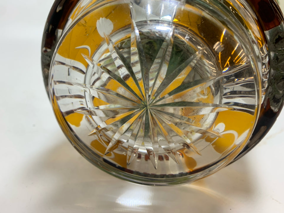 YELLOW BOUQUET IN ORANGE ETCHED GLASS VASE.