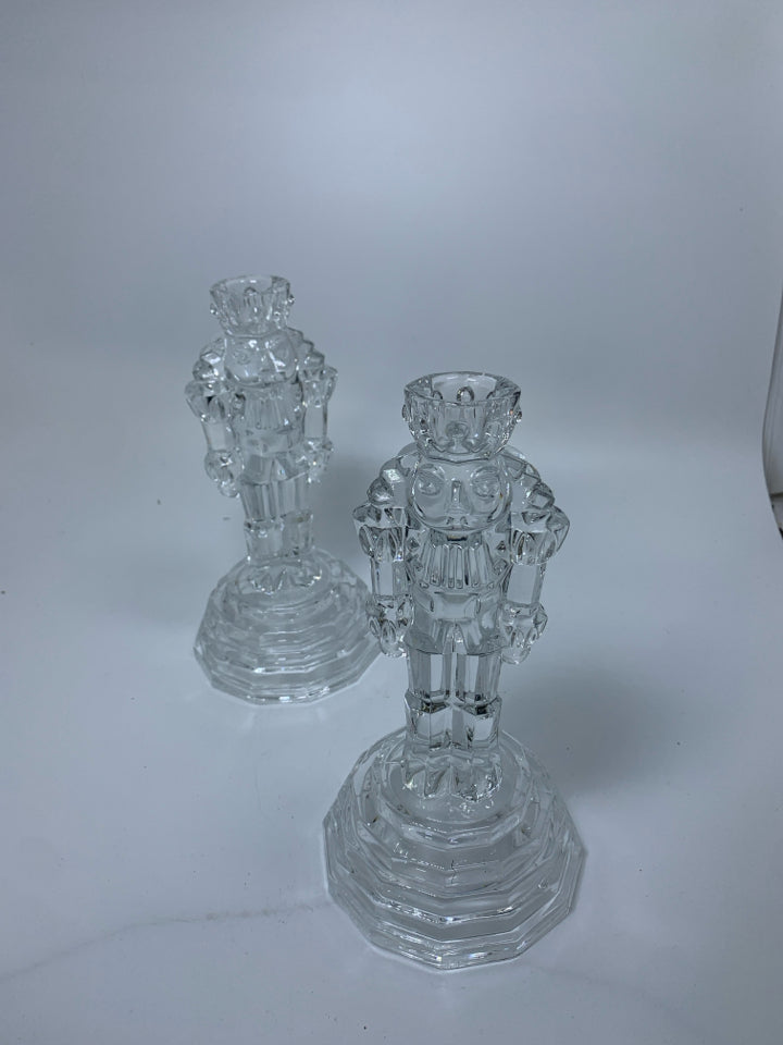 2 CRYSTAL NUTCRACKER TAPERED CANDLE HOLDERS.