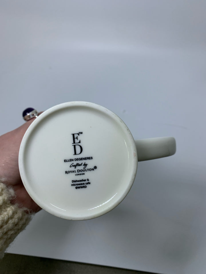 WHITE ROYAL DOULTON "JOY" MUG W/ RED SNOWFLAKES.