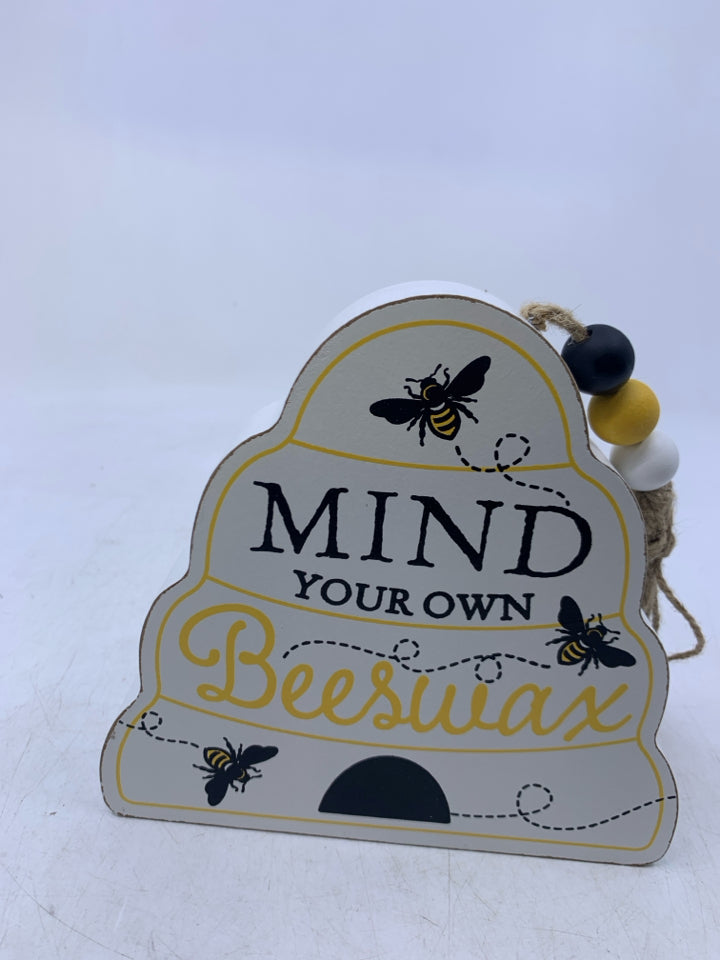 BEE HIVE SHAPED MIND YOUR OWN BEEWAX STANDING SIGN.