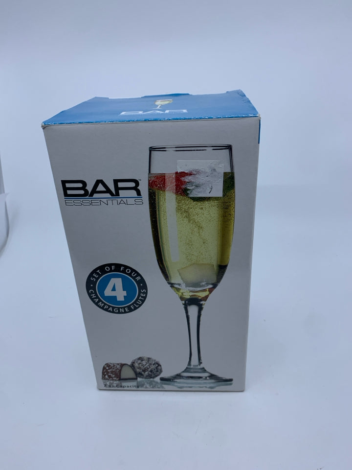 NIB 4 BAR CHAMPAGNE FLUTES.