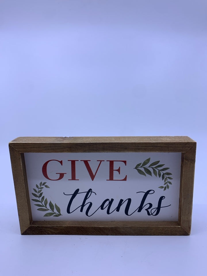 GIVE THANKS STANDING SIGN IN WOOD FRAME.