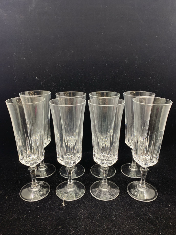 8 CUT GLASS CHAMPAGNE GLASSES.