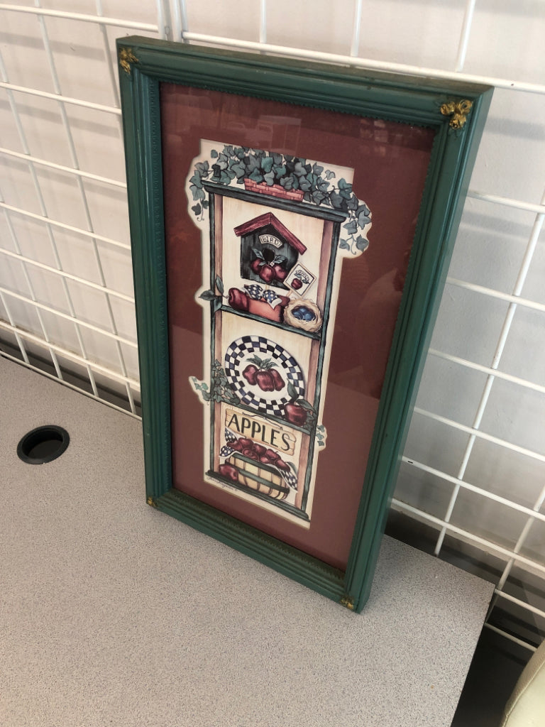 PRIMITIVE APPLE PRINT IN GREEN FRAME.
