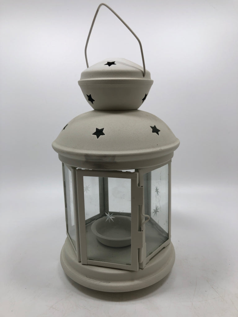 WHITE CANDLE LANTERN W/STAR-CUT OUTS.