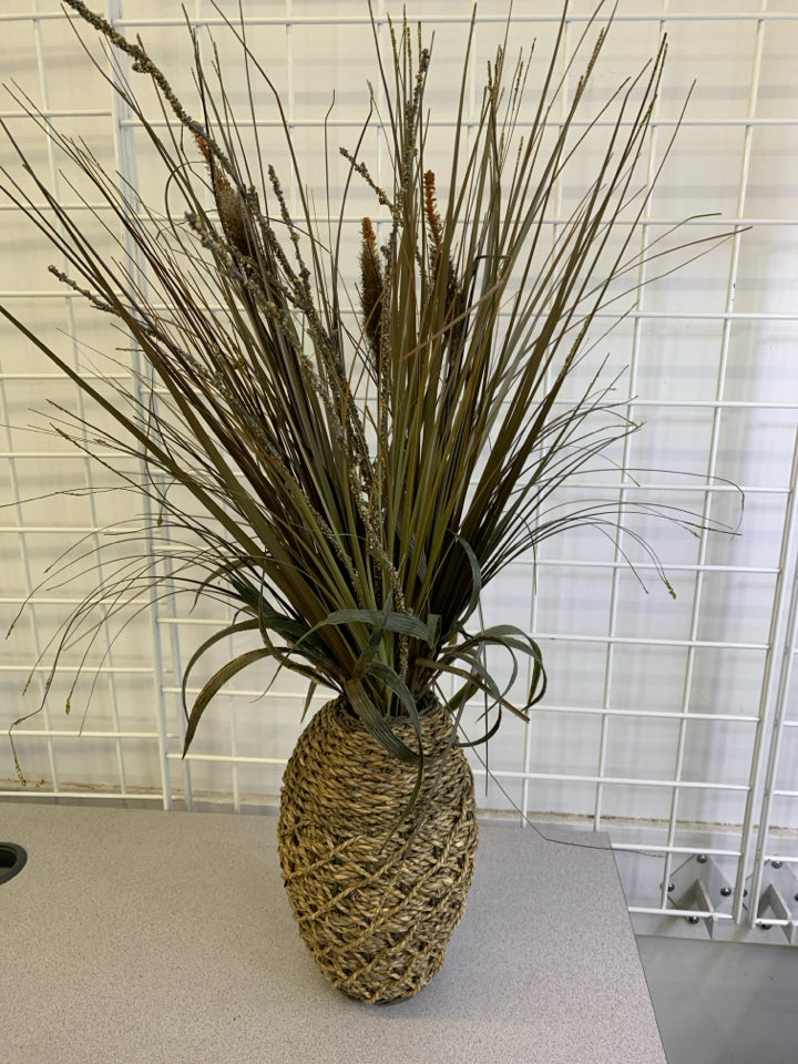 FAUX GRASS IN TWINE PLANTER.