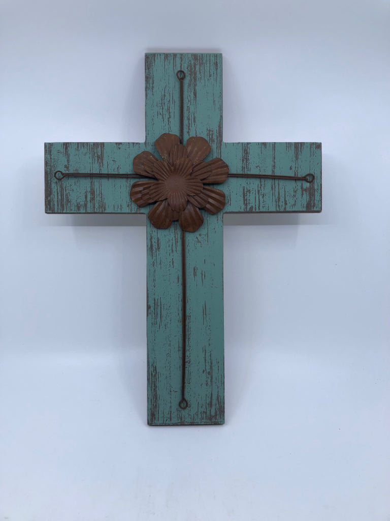 LOVING KINDNESS TEAL CROSS W/METAL FLOWER.