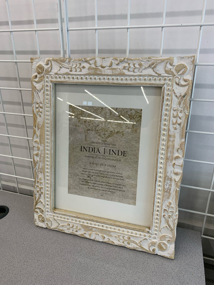 DISTRESSED CARVED LG PICTURE FRAME.