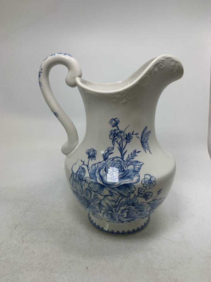 BLUE ROSES PATTERN PITCHER W/ EMBOSSED EDGE.