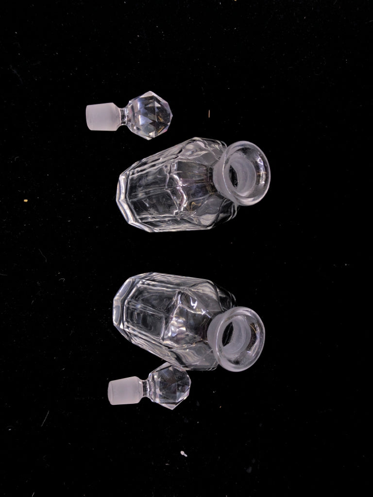 2 GLASS EMPTY BOTTLES W STOPPERS.