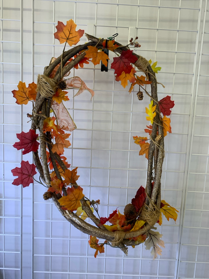 TWIG W FAUX LEAVES WREATH.