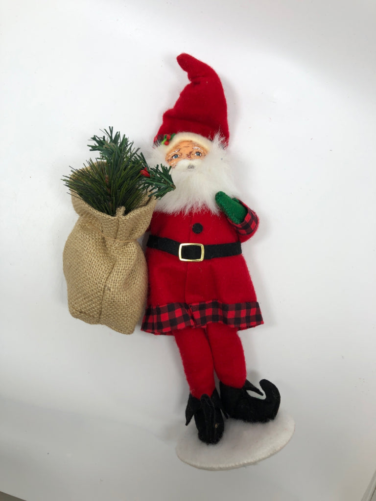 ANNALEE MINI SANTA IN ELF SHOES HOLDING CHRISTMAS SACK.