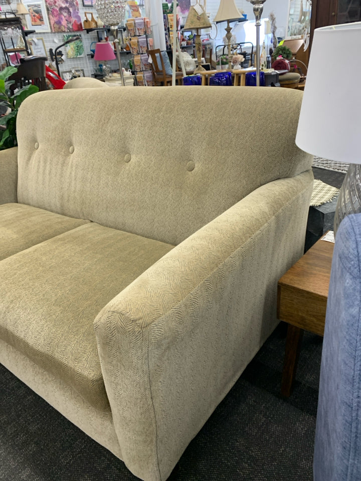 CREAM AND GREY ACCENT WOOD FOOTED LOVE SEAT.