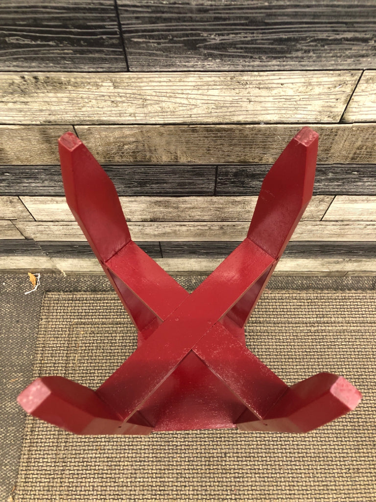 RED PAINTED WOODEN PLANT STAND.