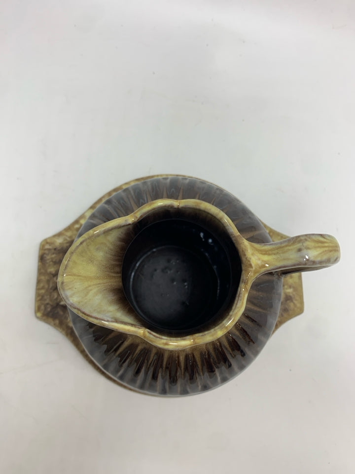 BROWN DRIP GLAZE CREAMER W/UNDER PLATE.