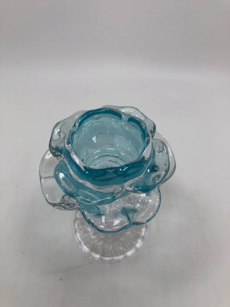 BLUE GLASS FLOWER CANDLE HOLDER.