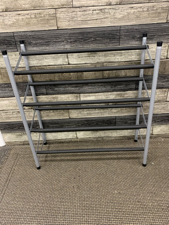 EXPANDABLE METAL SHOE RACK W/4 RACKS.