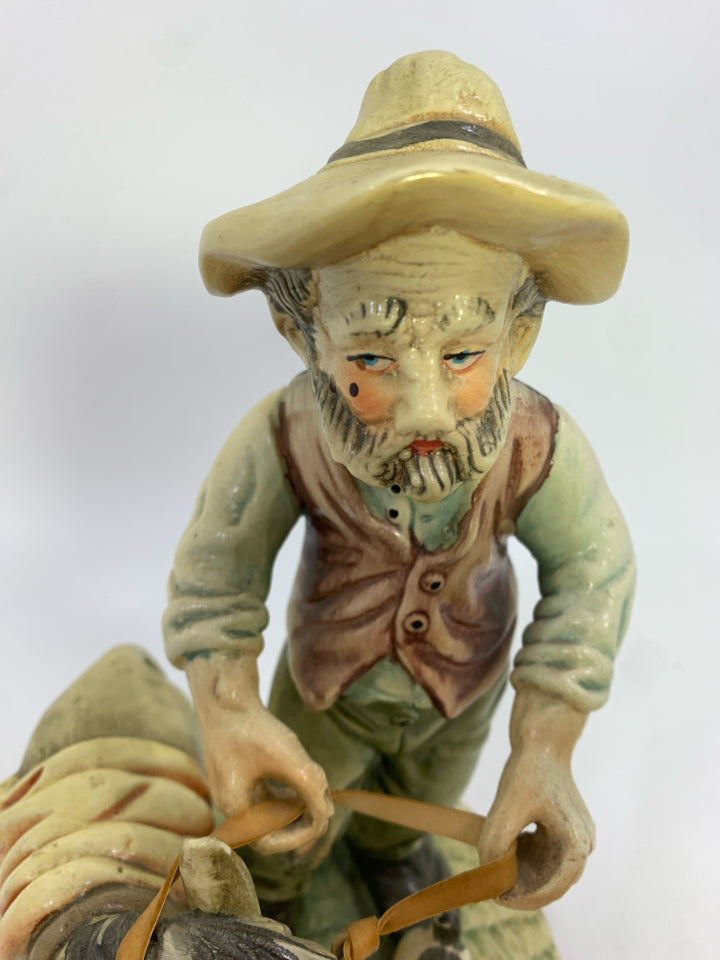 VTG PORCELAIN PROSPECTOR FIGURINE.