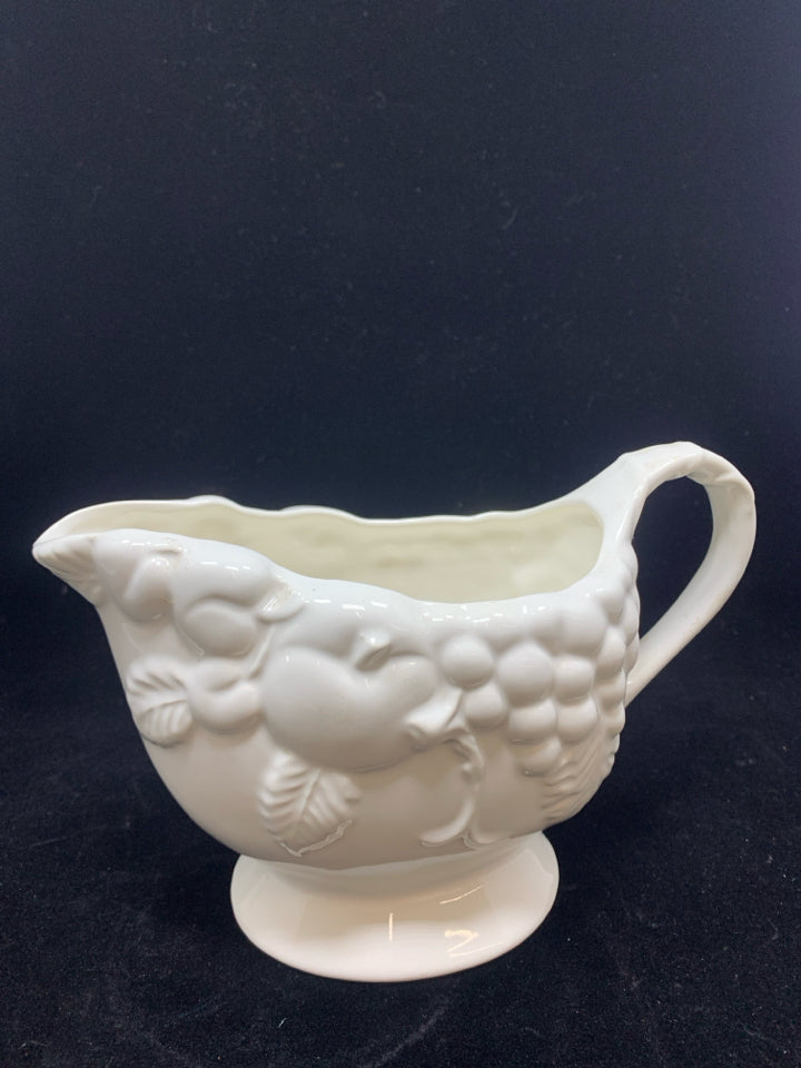 WHITE CERAMIC GRAVY BOAT W/EMBOSSED FRUIT.