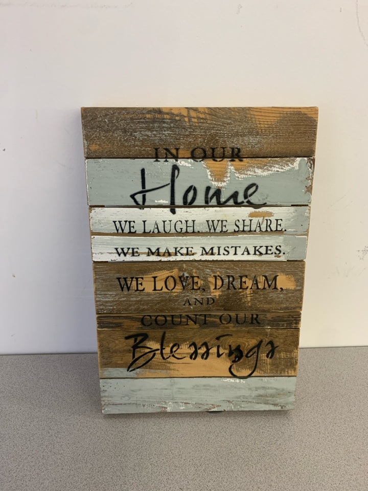 "IN OUR HOME" DISTRESSED WOOD WALL HANGING.