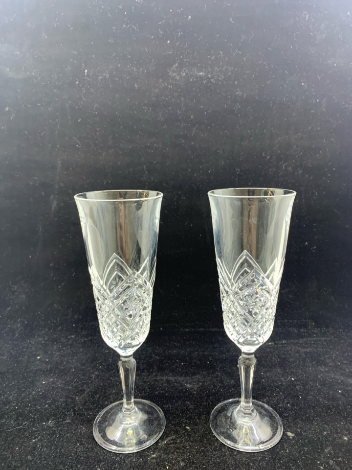 2 CUT-GLASS CHAMPAGNE FLUTES.