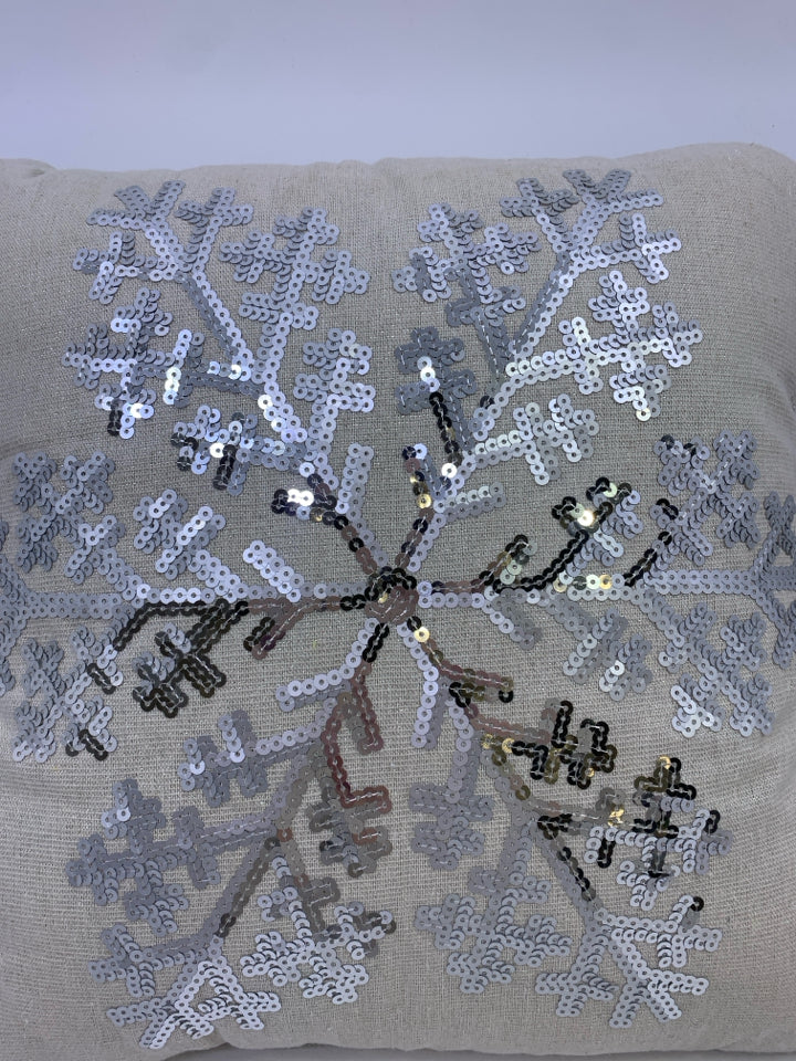 CREAM SPARKLE PILLOW W/ SEQUENCE SNOWFLAKE PILLOW.