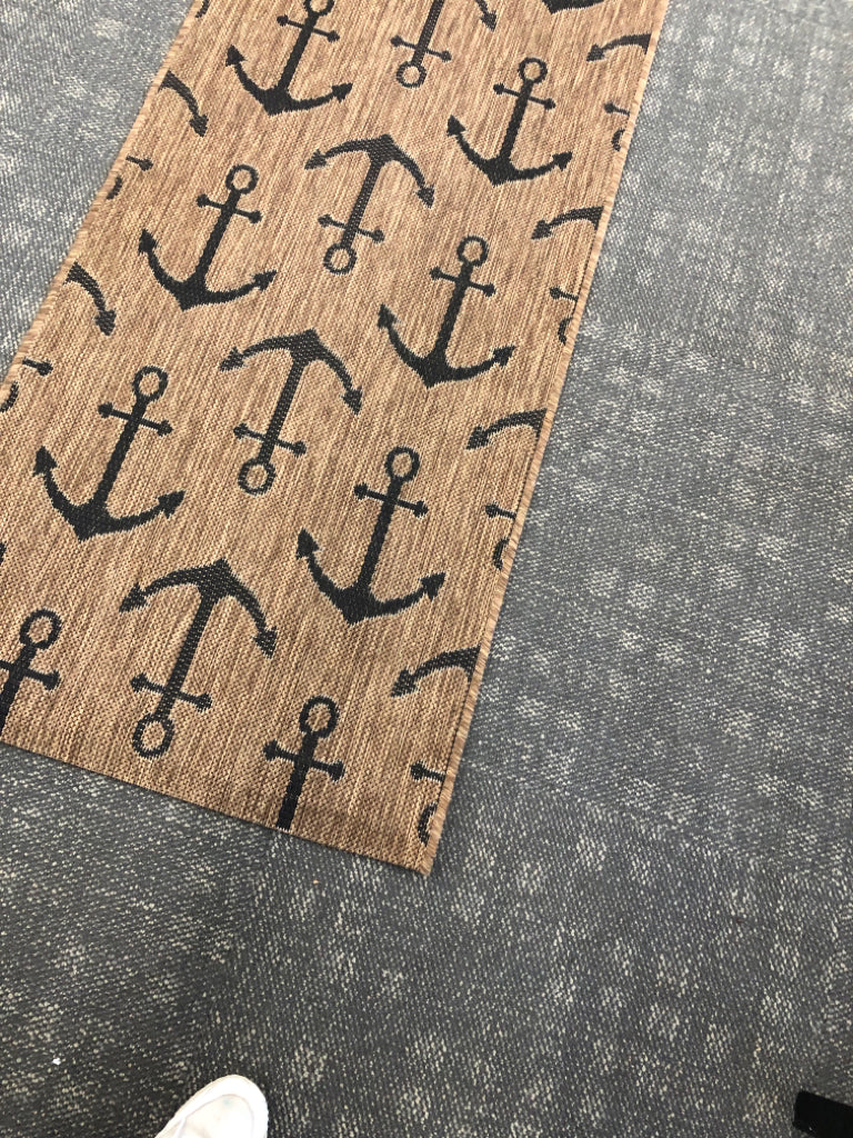 BROWN NAUTICAL TROPICAL OUTDOOR RUG.
