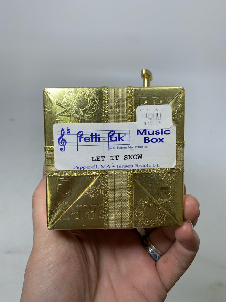 GOLD WRAPPED PRESENT "LET IT SNOW" MUSIC BOX.