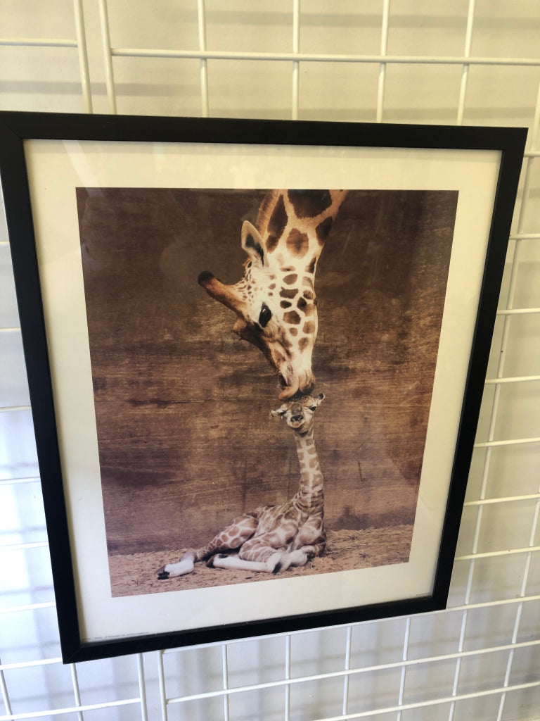 GIRAFFE WITH BABY IN BLACK FRAME WALL HANGING.