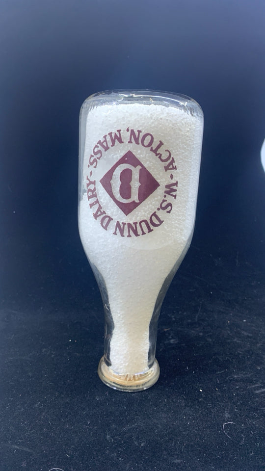 VTG MILK BOTTLE DUNN DAIRY W/ FILLER.