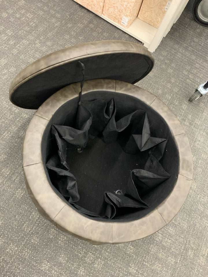 BROWN LEATHER TUFTED OTTOMAN W/SHOE STORAGE.