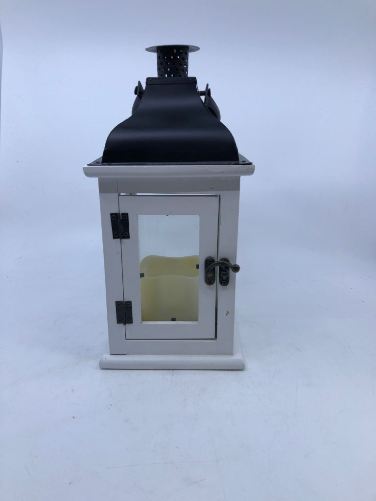 WHITE/BLACK LANTERN WITH LED FLICKERING CANDLE.