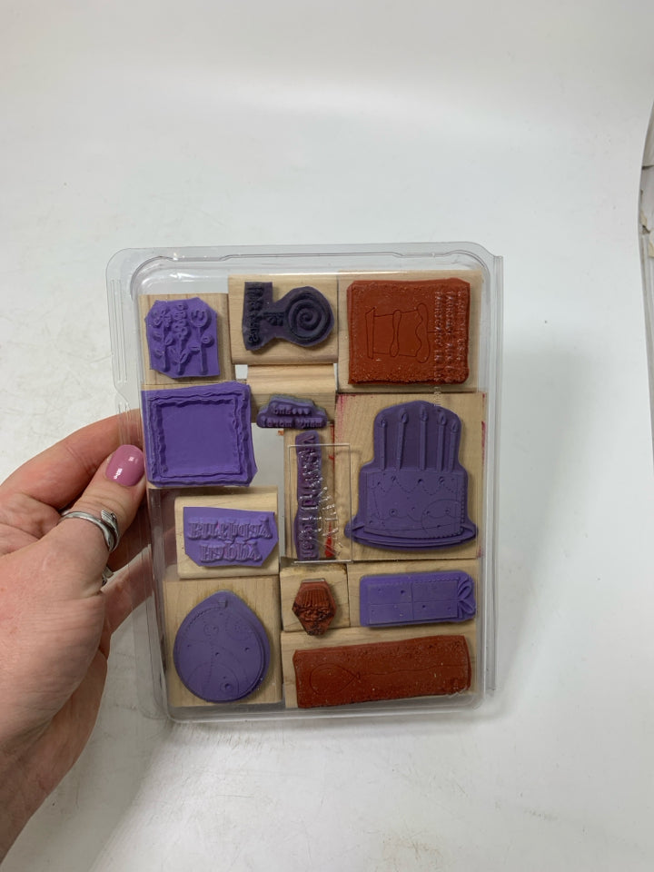 STAMPS IN CASE.