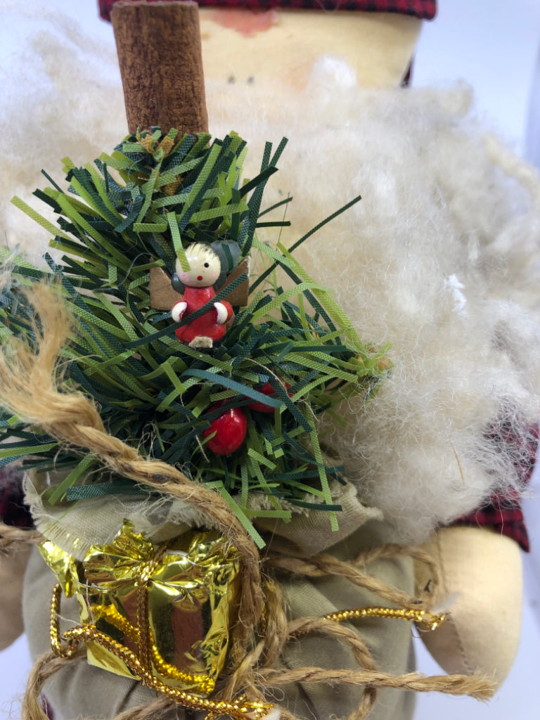 PRIMITIVE SANTA HOLDING TOYS FIGURE.