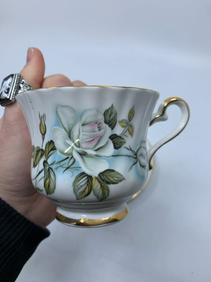 WHITE ROSES TEA CUP/SAUCER.
